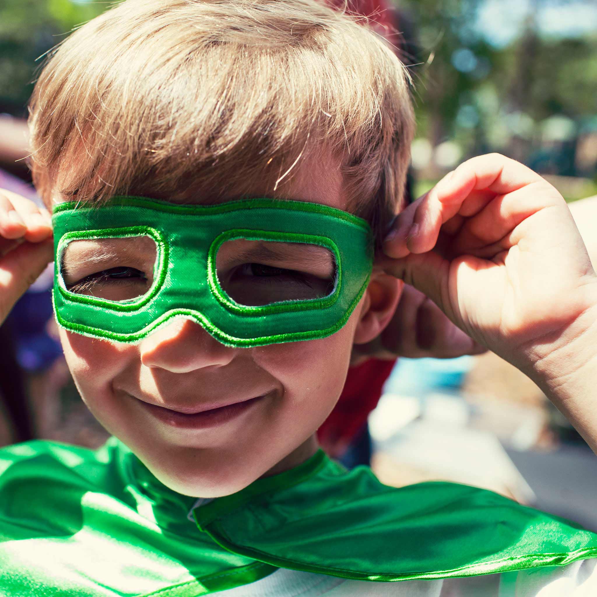 Youth Green Superhero Costume with Black Sunburst
