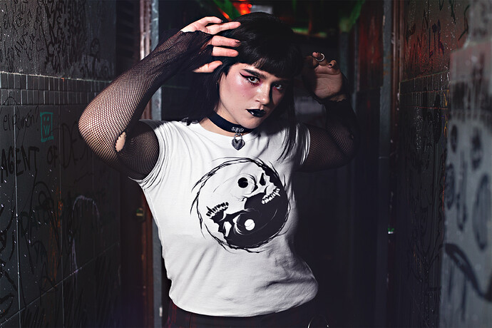 tee-mockup-featuring-a-goth-woman-at-a-dark-alley-wearing-fishnet-arm-warmers-26609 SM.jpg