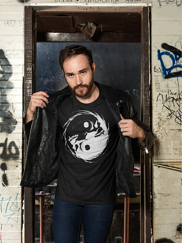 t-shirt-mockup-of-a-man-with-a-leather-jacket-in-an-abandoned-building-28192 01 SM.jpg